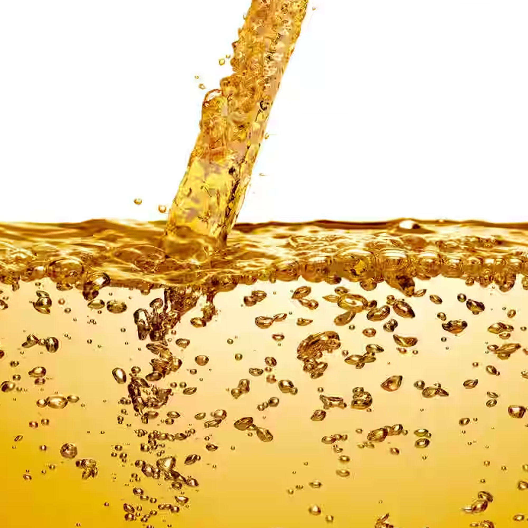 Golden liquid being poured, creating bubbles.